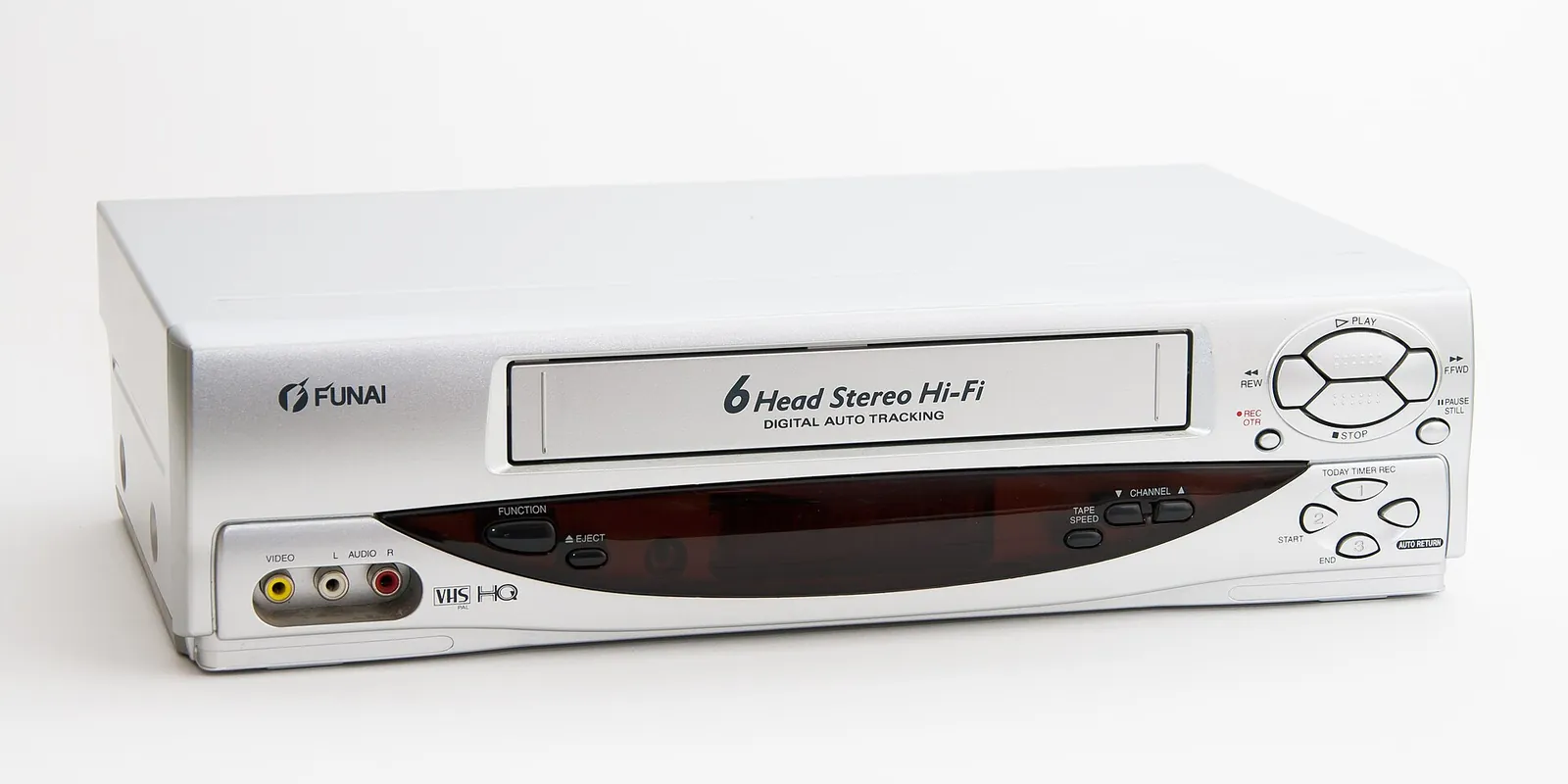 A silver VHS video recorder with its play, stop and rewind buttons
